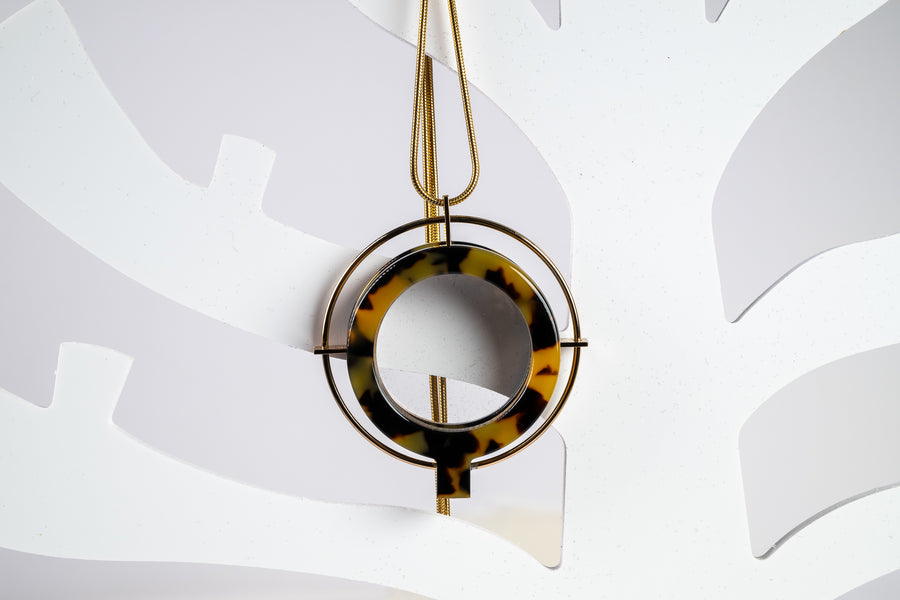 Saturn Medallion Glasses Pendant