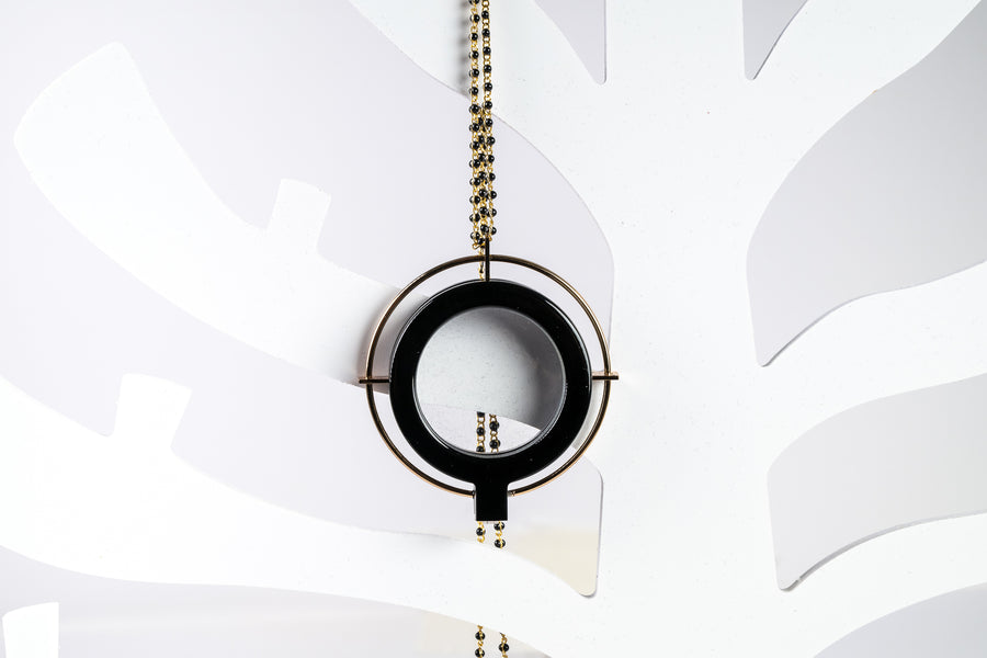 Saturn Medallion Glasses Pendant